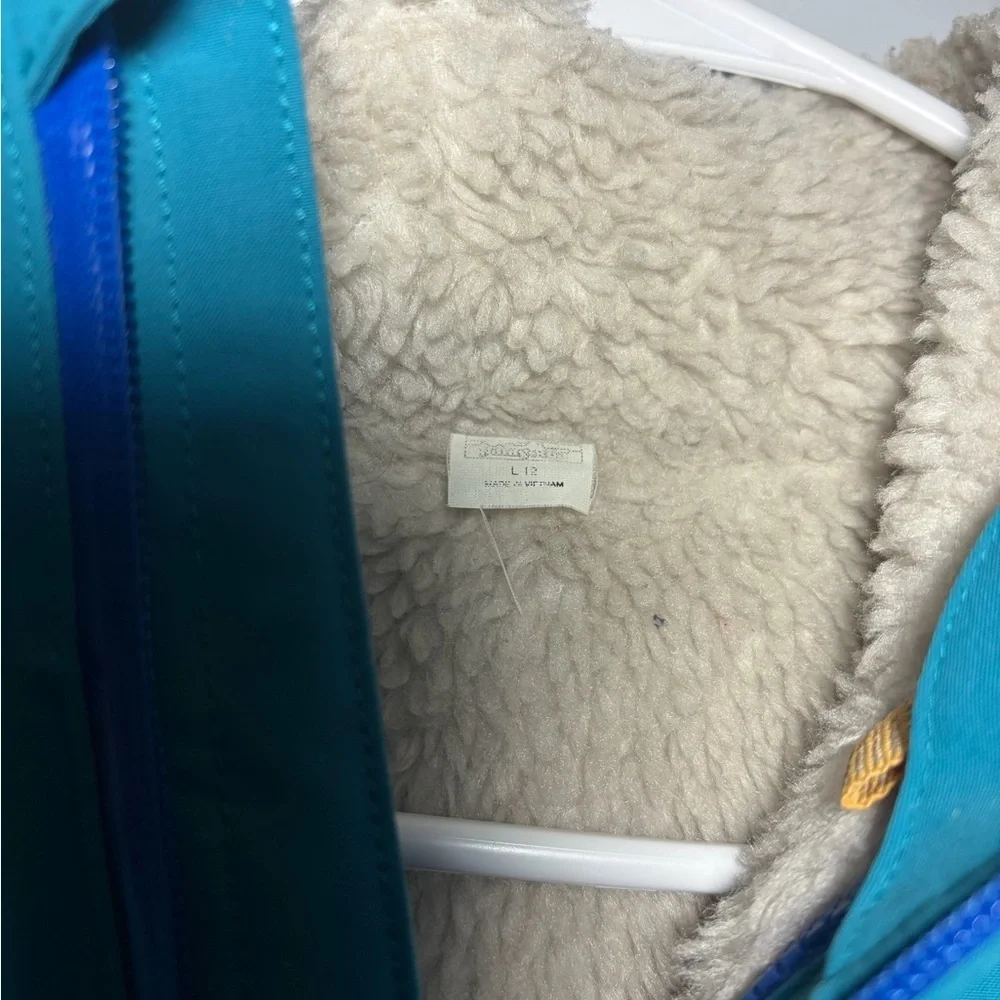 Patagonia Blue Jacket with Yellow Details